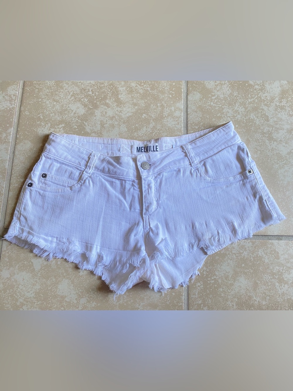 Brandy Melville white stretchy denim jean shorts.